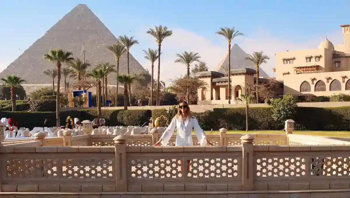 Egypt Day Tours - A group of tourists enjoying a private Egypt day tour at the Giza Pyramids and Great Sphinx.